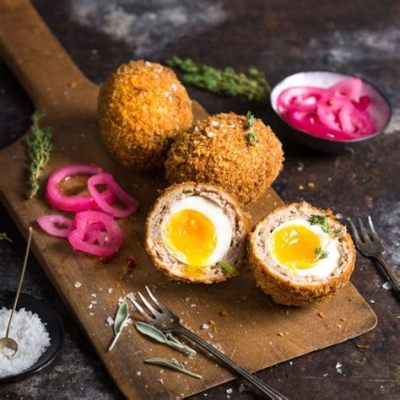  Scotch Egg! A Crispy Symphony of Flavorful Sausage and Creamy Yolk